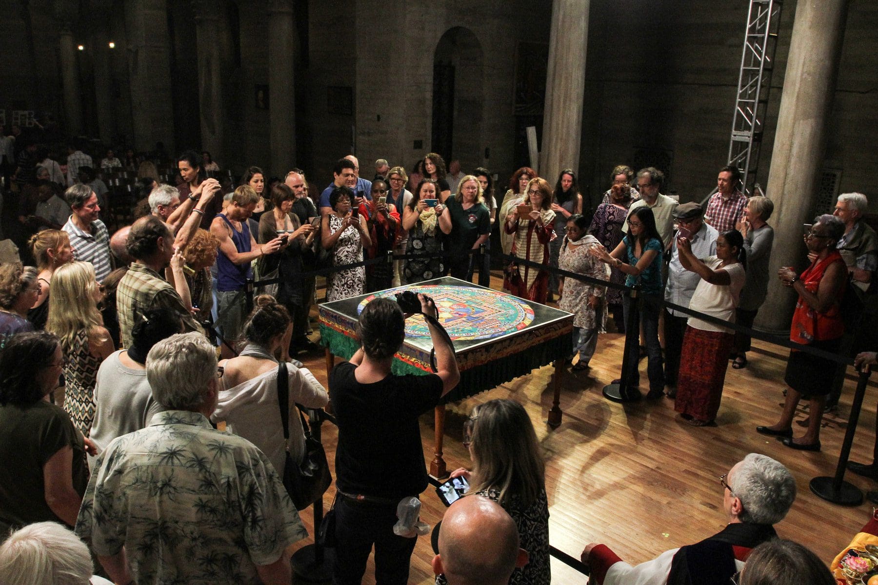 Audience photographs the Mandala of Compassion