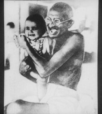1613px-Gandhi_hugging_a_child